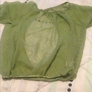 Green sheet blouse with an open back